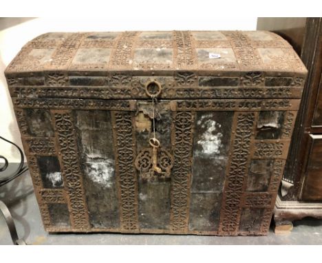 Antique leather covered and pierced metal bound dome lidded trunk, width 80cm.
