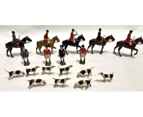 A Britains lead painted hunting set inc. five hunters on horseback, three standing hunters &amp; nine hounds