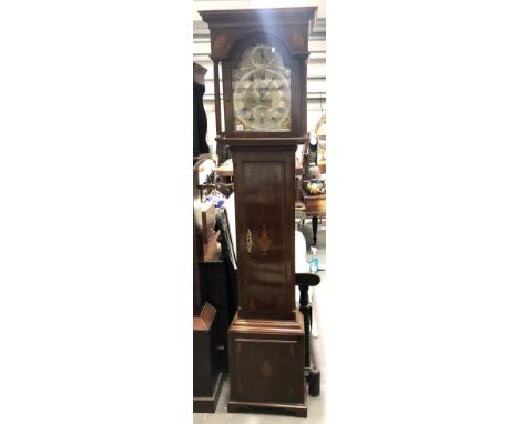 George III eight day long case clock, the brass arched 12in dial with strike silent dial, seconds dial and calendar aperture,
