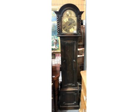 Oak cased three train grandmother clock with 7.5in brass arched dial inscribed 'TEMPUS FUGIT', height 167cm.