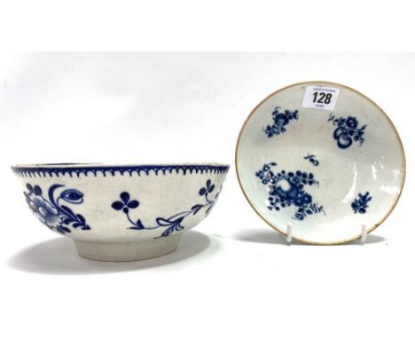 A late 18th century Worcester blue and white decorated dish, decorated with fruit and foliate sprays, hatch crescent mark to 