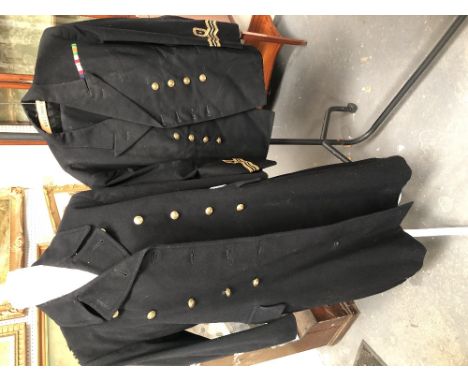 A British Naval Officer's uniform including trousers, jacket, great coat, cap and two pair of epaulettes.