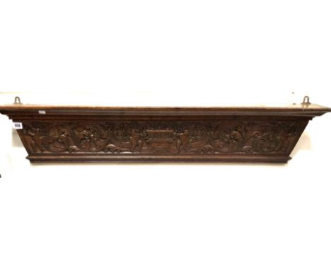 Late 19th Century oak carved shelf, width 112cm.