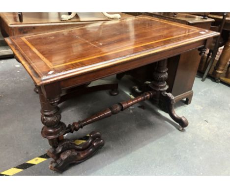 Victorian mahogany inlaid library table, the rectangular boxwood and ebony banded top over a spiral turned and carved pair of