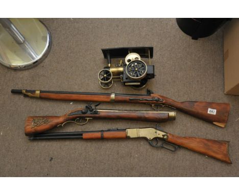 Three reproduction guns and a model traction engine