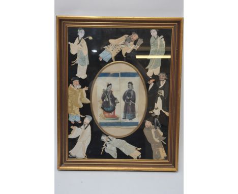 A framed rice paper and silk picture depicting figures