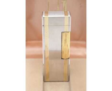 A boxed two tone Dunhill lighter 