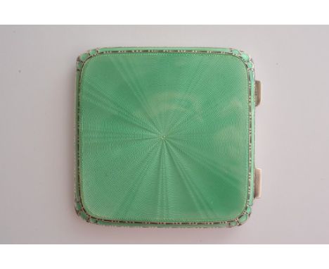 A silver and green guilloche enamel powder compact