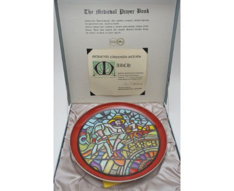A boxed limited edition Poole Pottery calendar plate designed by Tony Morris, number 976 of 1000, with certificate