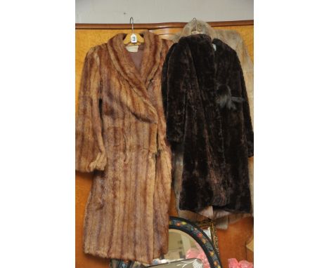 Three vintage fur coats one bearing Harrods label