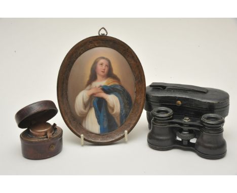 A small painted plaque plaque depicting a female religious figure, a cased inkwell and pair of opera glasses