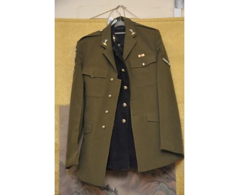 A blue Royal Marines Tunic Serge with label RMCC Chatham and dated 1954 together with a No.2 Army Dress jacket