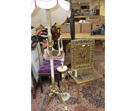 An onyx and gilt mounted floorlamp, conforming ashtray, square glass top table and brass firescreen