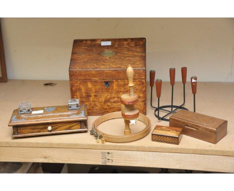 A wooden letter box, inkwell, modernist candlestick and treen odds