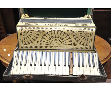 A cased accordion by Pietro