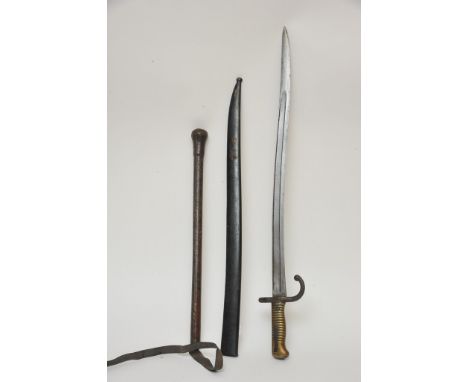 A 19th century French bayonet with brass hilt and scabbard and a  leather cosh