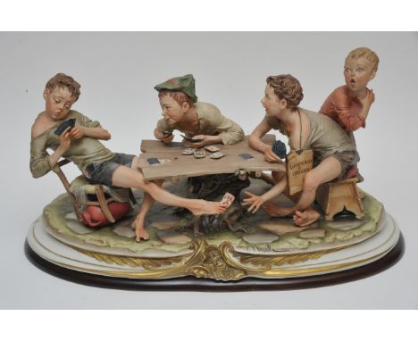 A very large Capodimonte card playing group