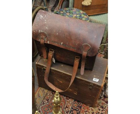 A small canvas trunk, leather satchel bag and small bag of textiles