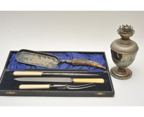 A silver plated oil lamp. crumb scoop and cased cutlery
