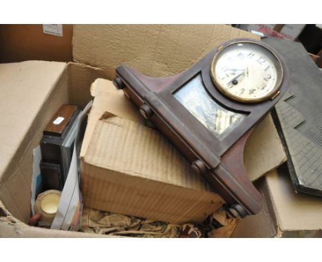 A cuckoo clock and two mantle clocks