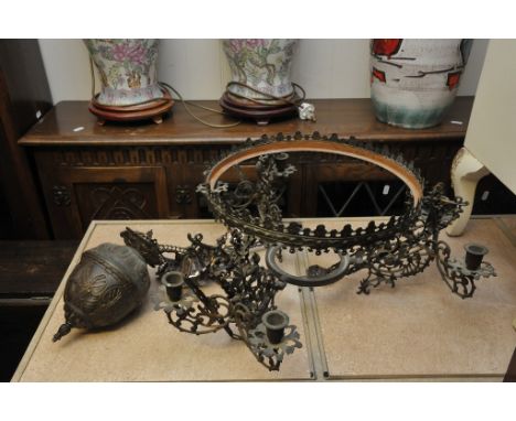 A continental cast metal hanging oil lamp