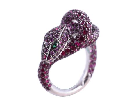 BOUCHERON, KAA, A PINK SAPPHIRE AND RUBY SERPENT RINGThe coiled serpent set with circular cut rubies and pink sapphires, with