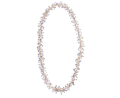 JACQUELINE RYAN, STICKLETS, A LAPIS LAZULI AND GOLD COLOURED NECKLACE CIRCA 1998The interlocking 'Sticklet' links each with a