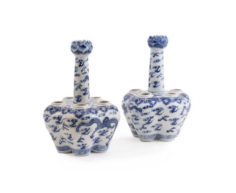 A PAIR OF CHINESE 'DRAGON' BLUE AND WHITE CROCUS VASESQING DYNASTY, 19TH CENTURYOf lobed form with a central cylindrical neck