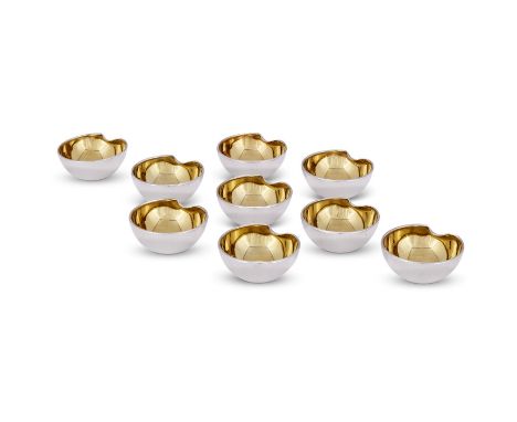 NINE ITALIAN SILVER THUMBPRINT SALT CELLARS ELSA PERETTI FOR TIFFANY & CO., IMPORT MARKED FOR LONDON 2002 The interiors gilt 