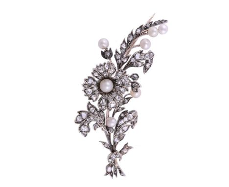 A VICTORIAN DIAMOND AND BOUTON PEARL FLORAL SPRAY BROOCH CIRCA 1870The spray set with rose cut diamond and bouton pearl accen