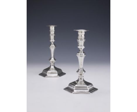 A PAIR OF GEORGE I CAST SILVER HEXAGONAL CANDLESTICKS JOSEPH STEWARD I, LONDON 1719 Britannia standard, with transferable soc