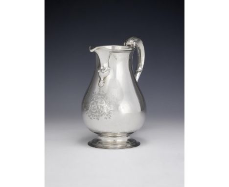 A GEORGE II SILVER BALUSTER BEER JUG THOMAS FARREN, LONDON 1742 With a leaf-capped S-scroll handle, a spout resting on scroll