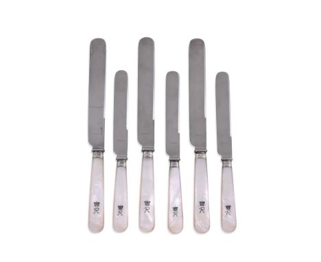 Y THREE SETS OF TWELVE MOTHER OF PEARL HANDLED TABLE KNIVES AND THREE SETS OF DESSERT KNIVES EN SUITE TWO SETS STAMPED FOR HA