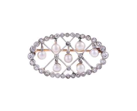 AN EARLY 20TH CENTURY DIAMOND AND PEARL LATTICE BROOCH CIRCA 1910The pierced oval brooch with old cut diamond border and latt