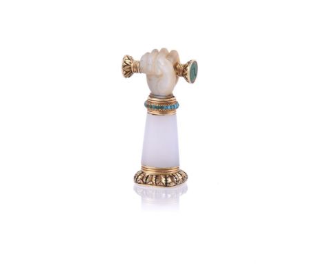 Y A REGENCY GOLD, CHALCEDONY, MOTHER OF PEARL AND GEM SET DESK SEAL UNMARKED, CIRCA 1825-1835 Carved as a fist clenching a ba