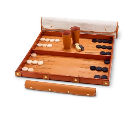 A LEATHER BACKGAMMON SET HERMÈS, 21ST CENTURY With a rolled leather playing mat, beechwood frame, two leather cups, game piec