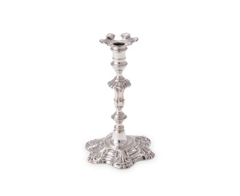 AN EARLY GEORGE III CAST SILVER HEXALOBED TAPER STICK WILLIAM GRUNDY, LONDON 1760 The hexalobed sconce with shells at the rim