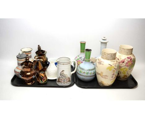 A selection of decorative ceramic wares, including: four various copper lustre ware jugs; two sprigged blue and white mugs; v