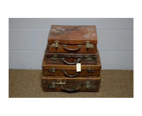 A vintage leather case by Army &amp; Navy Co-operative Society, 51 x 36cms; and three other vintage leather cases various siz