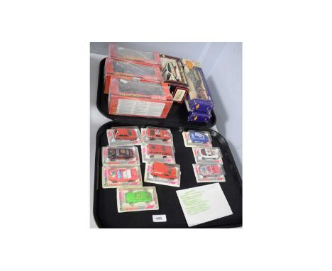A collection of Majorette 200 series model cars, each in blister pack; together with other boxed diecast model vehicles inclu