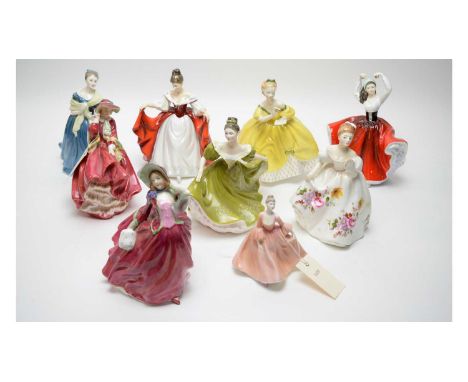 A collection of Royal Doulton ceramic figures of ladies, including: ‘Karen’ HN2388; ‘Autumn Breezes’ HN1934; ‘Top o’ the Hill
