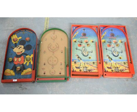 A Mickey Mouse Bagatelle board; together with two Dan Dare bagatelle boards; and another. (4) 