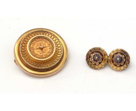 Two Victorian gold brooches, one of Etruscan revival roundel form, tests as 14-18ct gold, with vacant hair plaque to reverse,