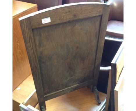 A WOODEN FIRE SCREEN