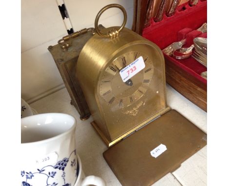 TWO BRASS CLOCKS AND A CIGARETTE CASE     D3