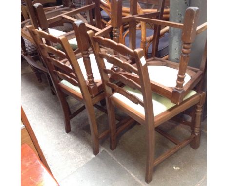 A SET OF 6 LADDER BACK CHAIRS