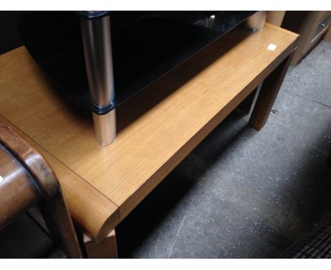 A LIGHT OAK COFFEE TABLE