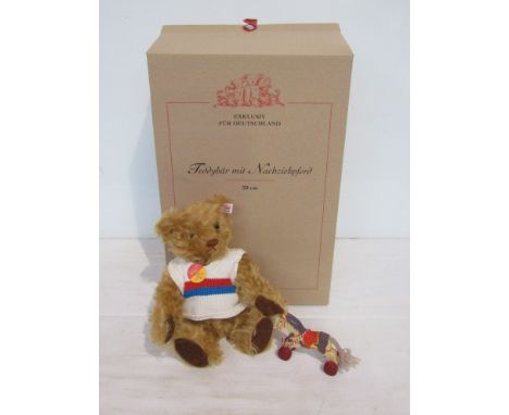 A boxed Steiff Deutschland edition 2002 bear with certificate and pull-along horse 