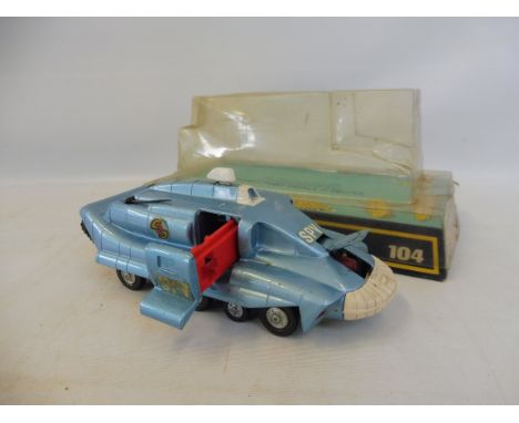 Dinky Toys 104 Spectrum Pursuit Vehicle, Captain Scarlet series, model and bubble pack in at least very goiod condition.