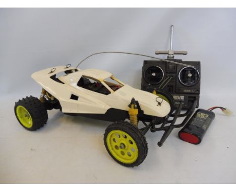 A Tamiya Grass Hopper II, a 1988 high impact styrene body, AP/227F controller.